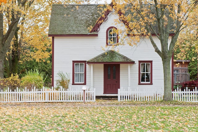 small white and red house