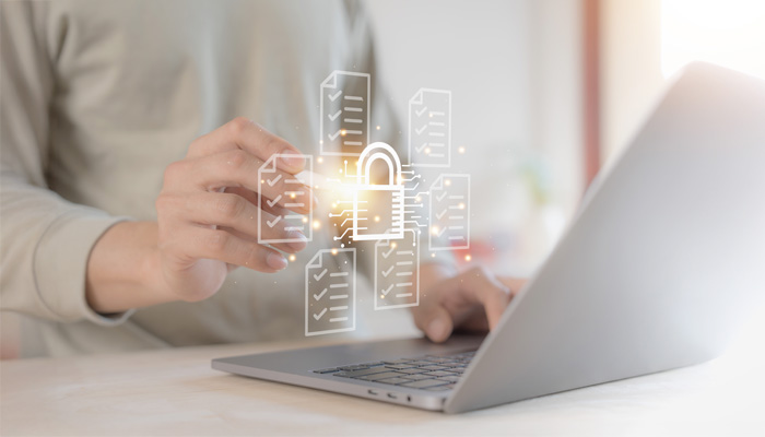 business man protect data by lock icon holographic technology protecting personal data on laptops and virtual interfaces prevent mail from scammer