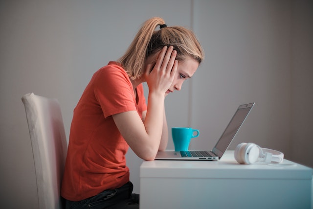 stressed woman using computer