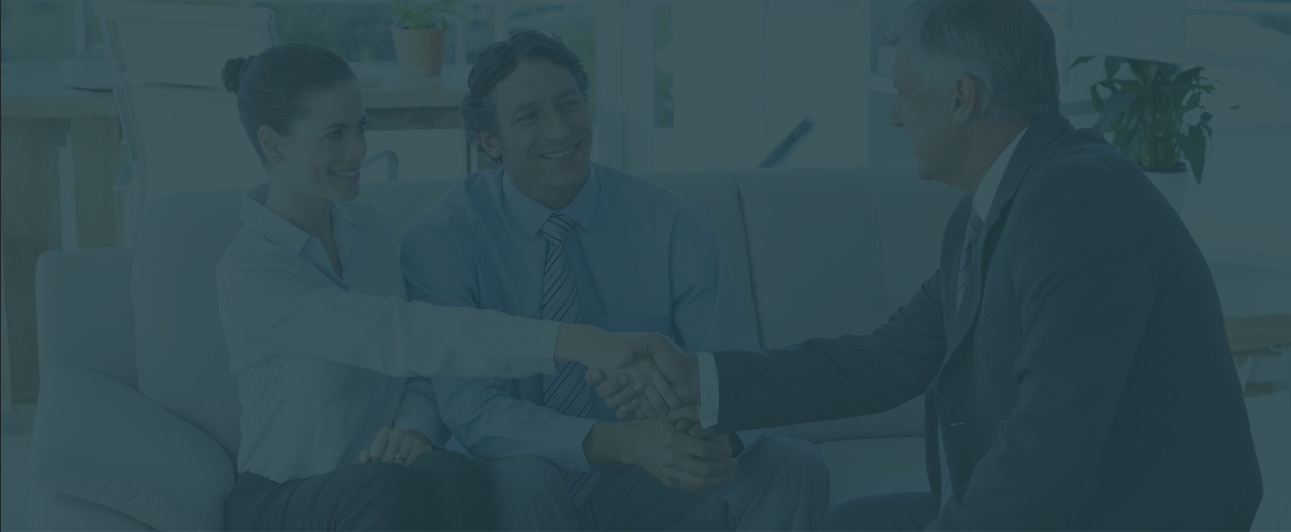 lawyer shaking hands with a female client