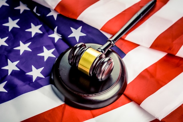 gavel on top of american flag